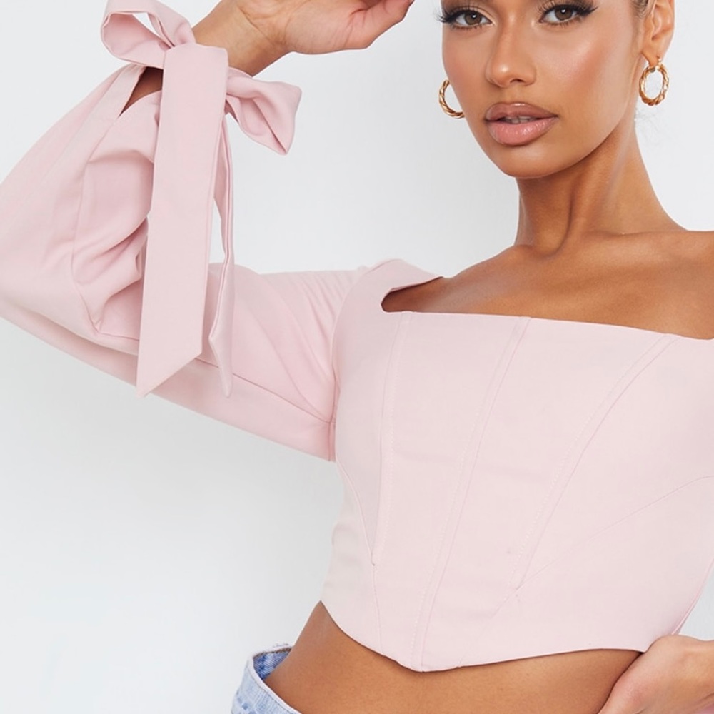 Pink long sleeve woven top